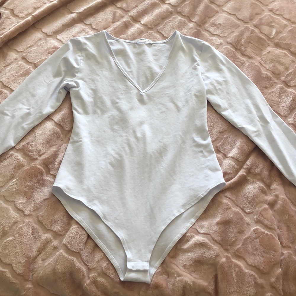 V-Neck Long Sleeve Bodysuit Jumpsuit. Size M. Worn once. Smoke free home